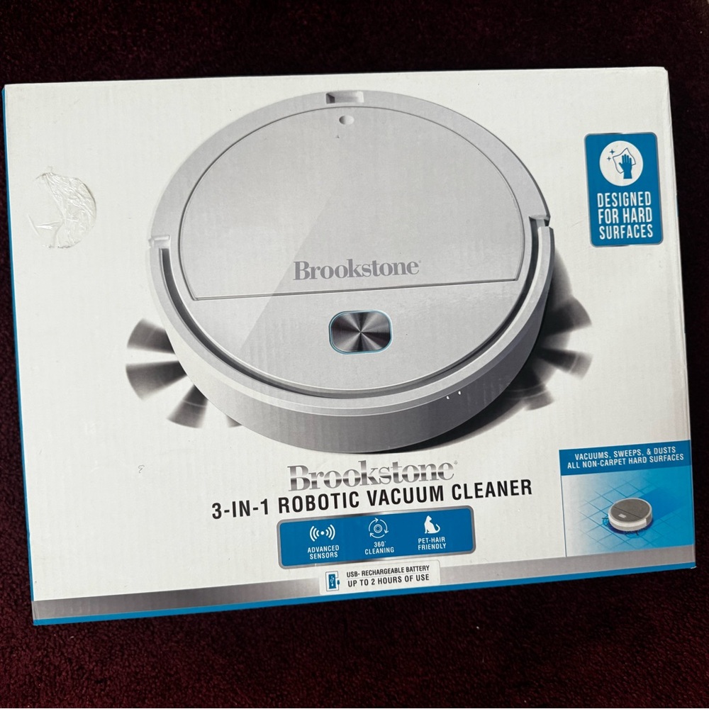 Brookstone White Robotic Floor Vacuum - Round Design